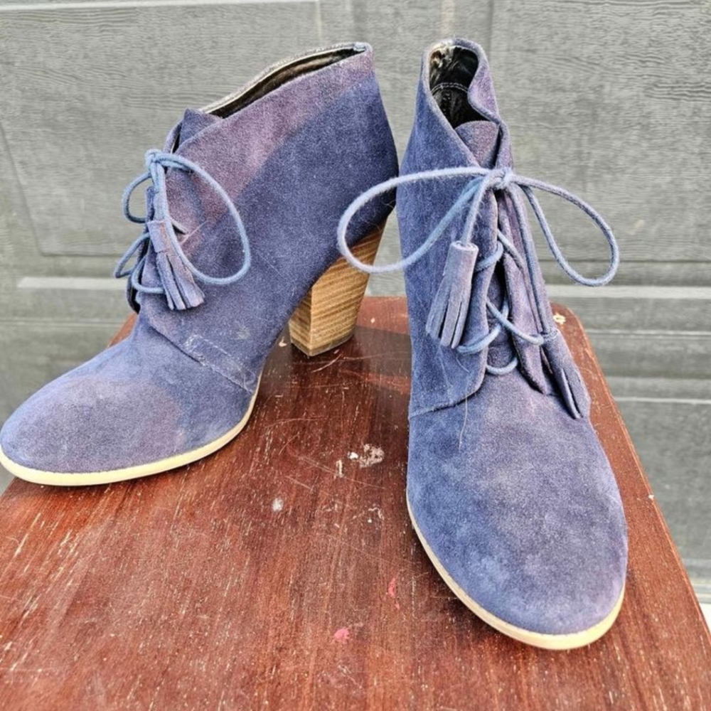 Blue suede heeled boots